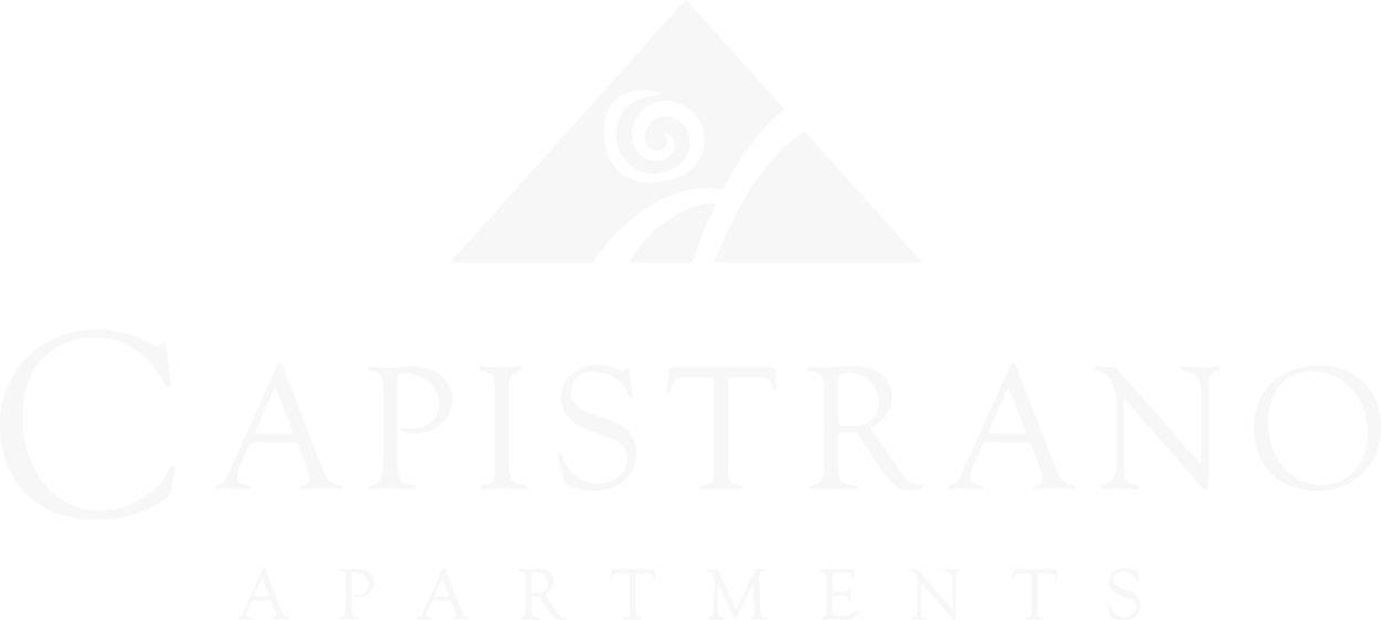 The image is a logo for Capistrano Apartments.